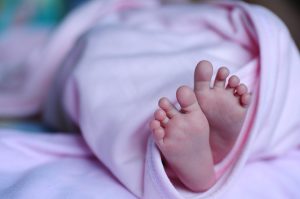 The feet of a human baby